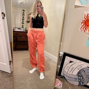 Never worn! Orange Nike fleece sweatpants
